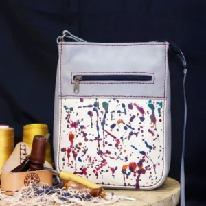 paint splatter grey leather sling bag