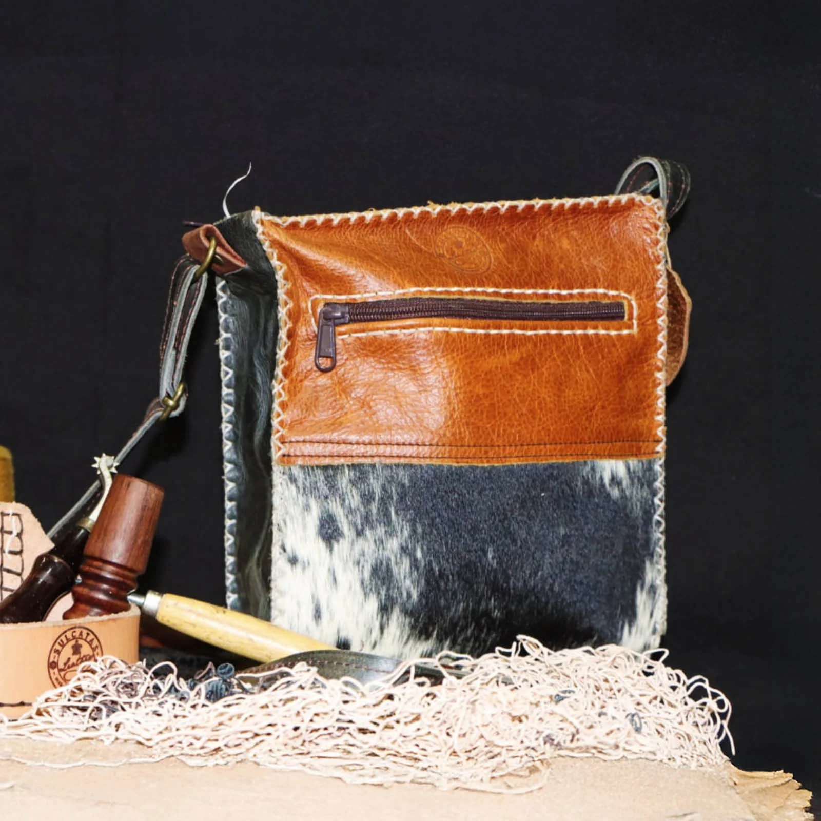 tan speckled nguni hide sling bag tan speckled nguni hide sling bag