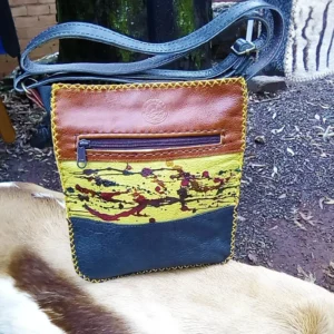 tan, yellow and navy leather sling bag